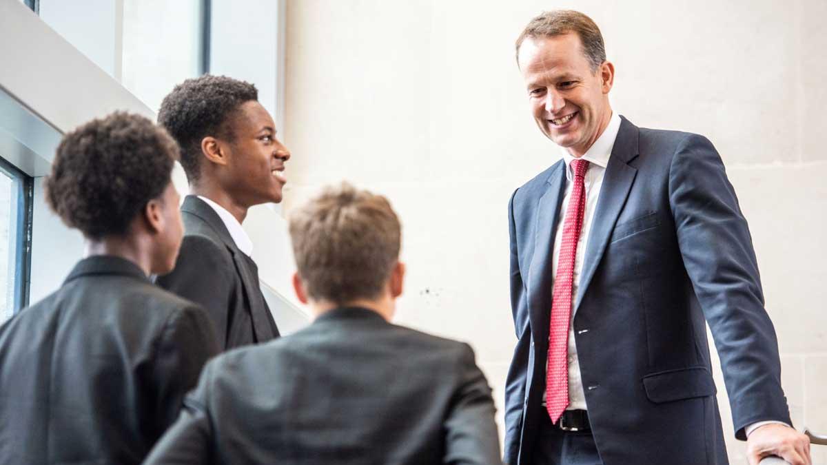 Headmaster talking with Students